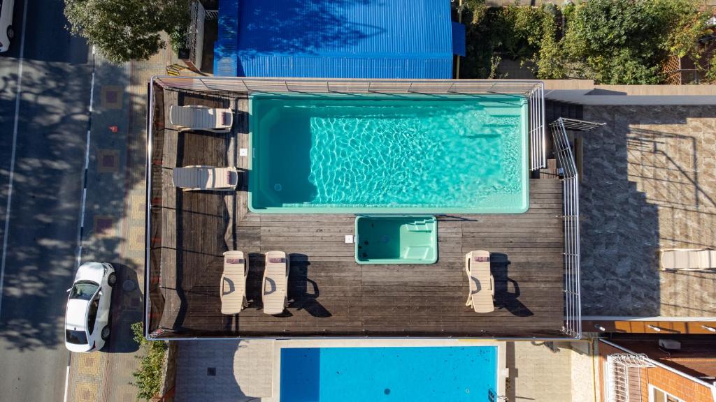 an overhead view of a swimming pool on a building at Guest House Lima in Gelendzhik