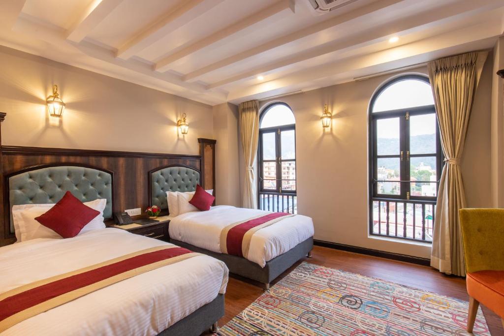 Postel nebo postele na pokoji v ubytování Hotel Pabera Heritage Boutique