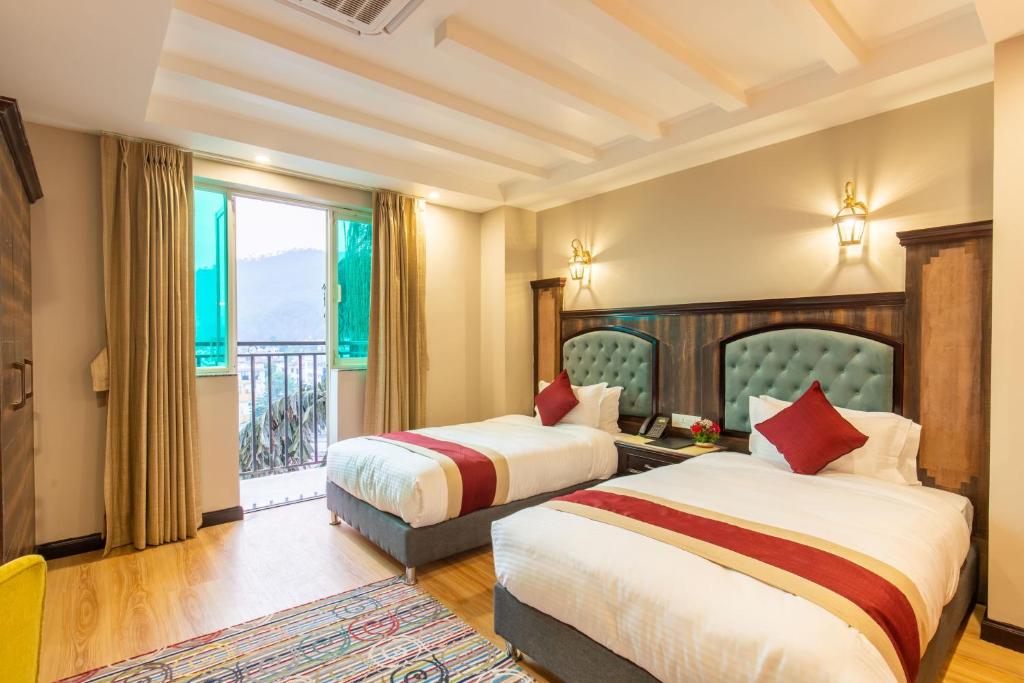 Postel nebo postele na pokoji v ubytování Hotel Pabera Heritage Boutique