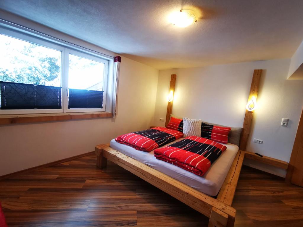 Postel nebo postele na pokoji v ubytování Haus Maria Larcher