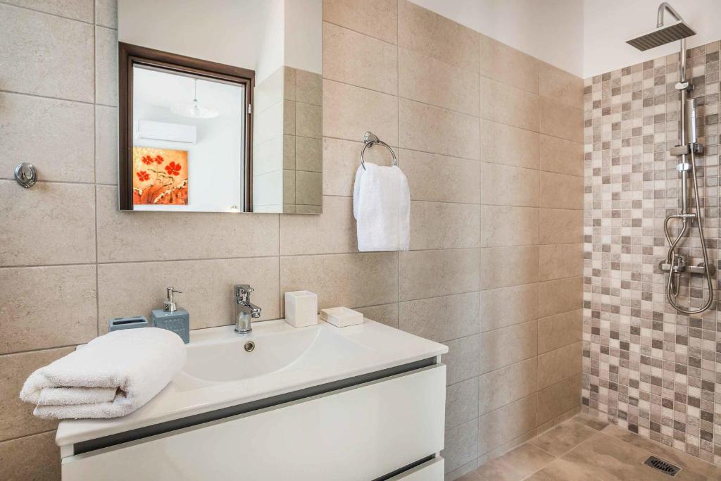 Kúpeľňa v ubytovaní Villa Theofilos