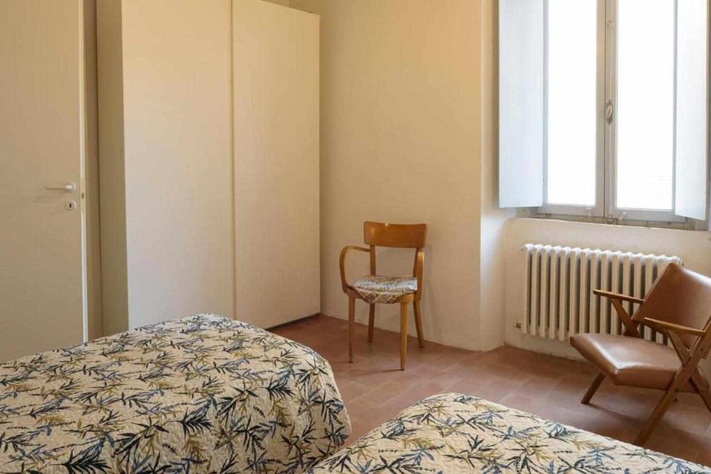 Posteľ alebo postele v izbe v ubytovaní CASA LELLA Monte San Pietrangeli