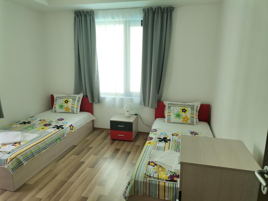 Postel nebo postele na pokoji v ubytování Family Apartments Amadeus lux
