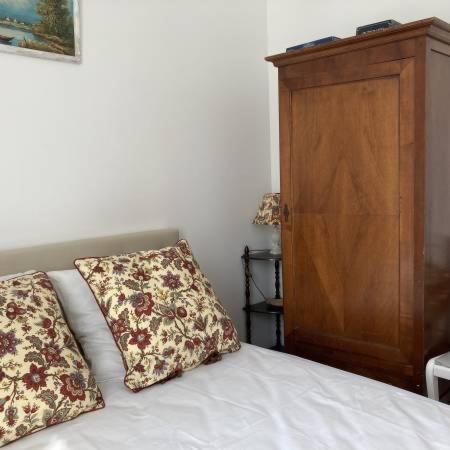 Postel nebo postele na pokoji v ubytování Notre Dame de la Mer
