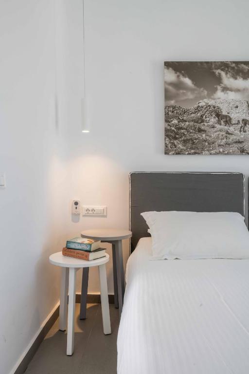 Postel nebo postele na pokoji v ubytování Argo Hotel