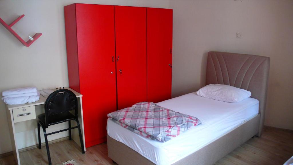 A bed or beds in a room at Trabzon Star Pension