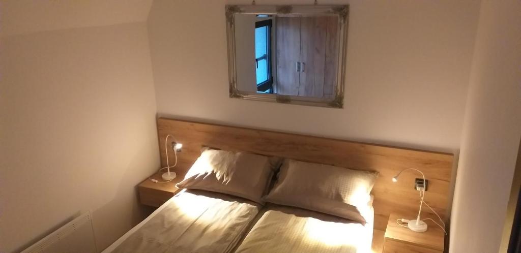 Postelja oz. postelje v sobi nastanitve apartman SUPERKLASIKO