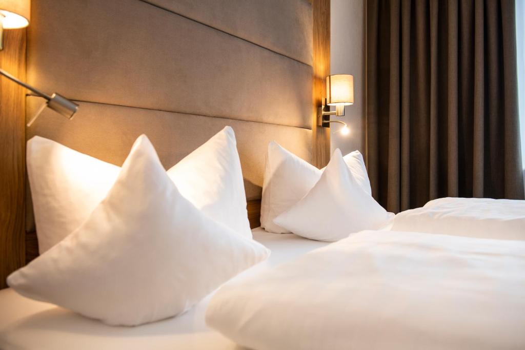 Postel nebo postele na pokoji v ubytování Hotel Elisabeth