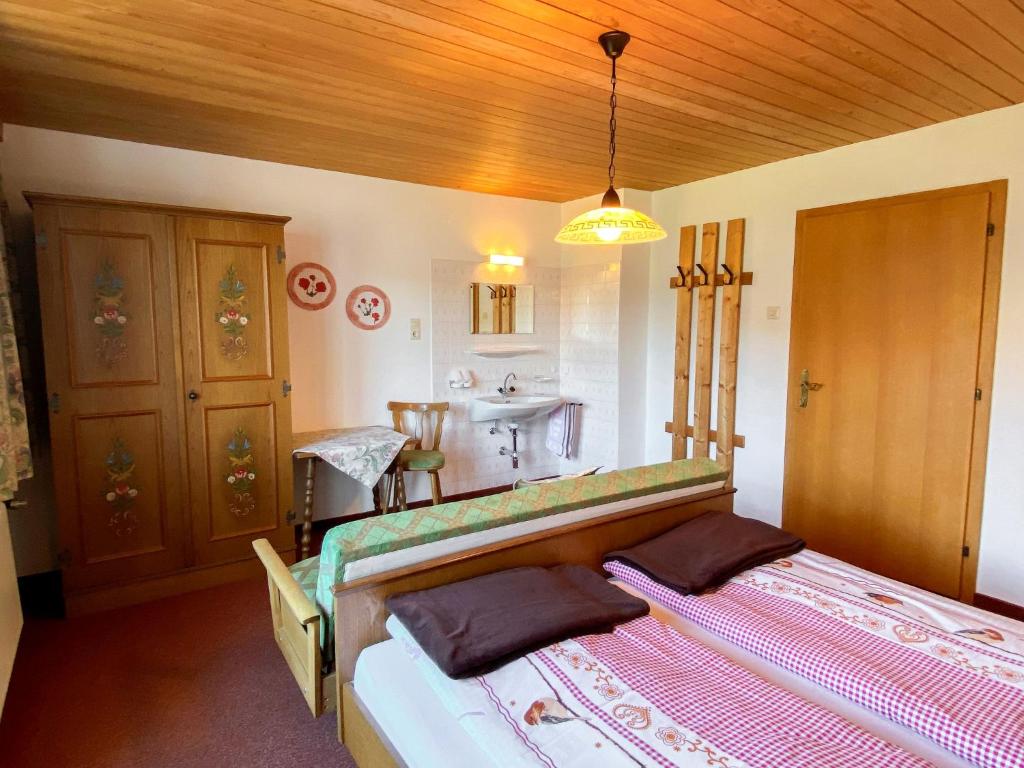 A bed or beds in a room at Apartment Baumannerhof-1 by Interhome