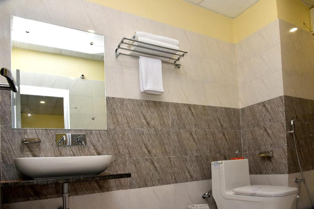Koupelna v ubytování HOTEL TRIDEV GRAND