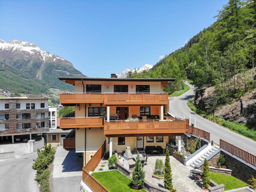 a house with a balcony on a mountain at Apartment Leiter-1 by Interhome in Sölden