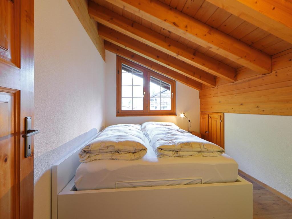 Postel nebo postele na pokoji v ubytování Apartment Les Violettes-2 by Interhome