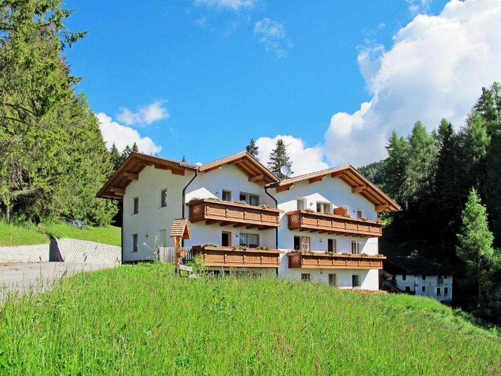 a house on the side of a hill at Apartment Obermüllerhof-1 by Interhome in Maranza