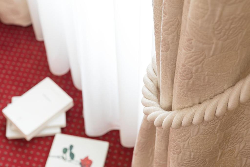 Postel nebo postele na pokoji v ubytování Hôtel Spa Thermalia