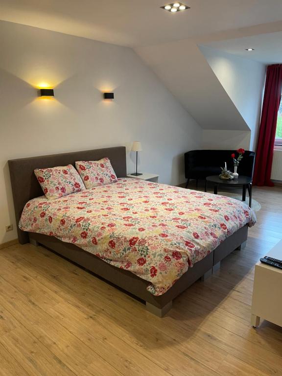 Postel nebo postele na pokoji v ubytování B&B groot-bijgaarden center