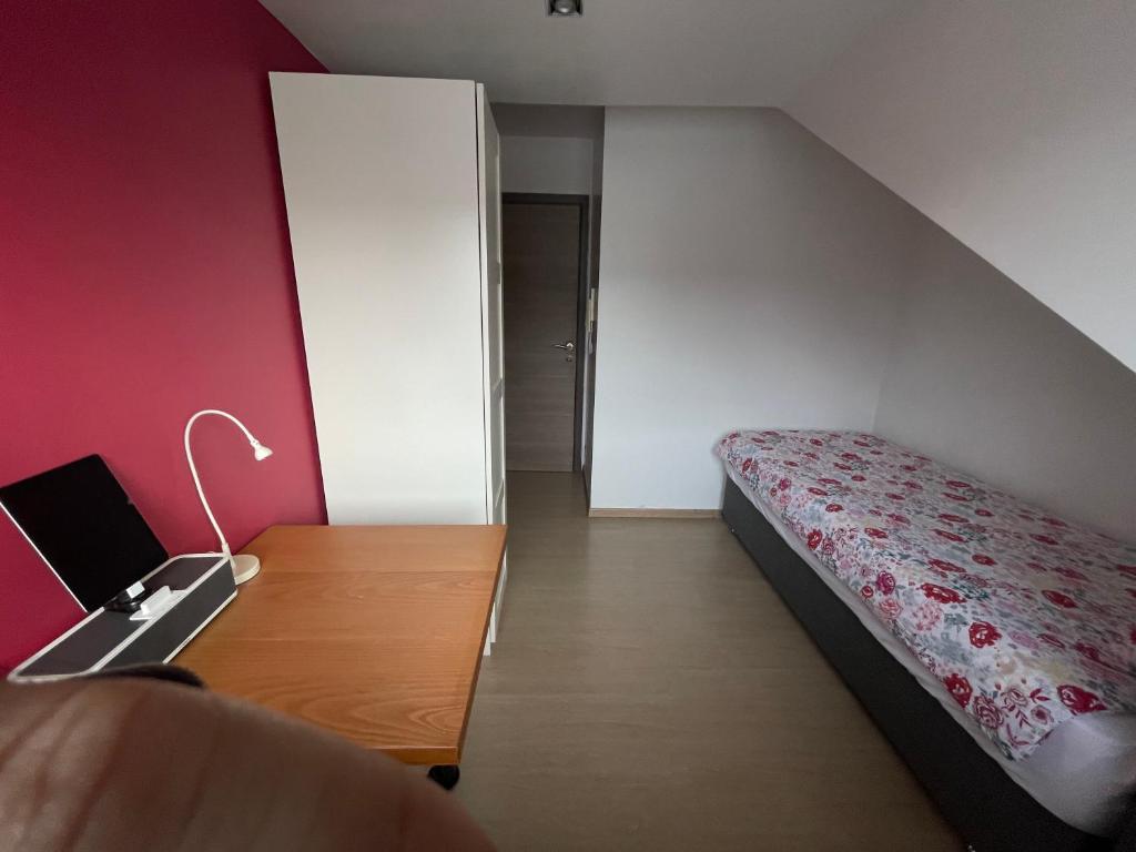 Postel nebo postele na pokoji v ubytování B&B groot-bijgaarden center