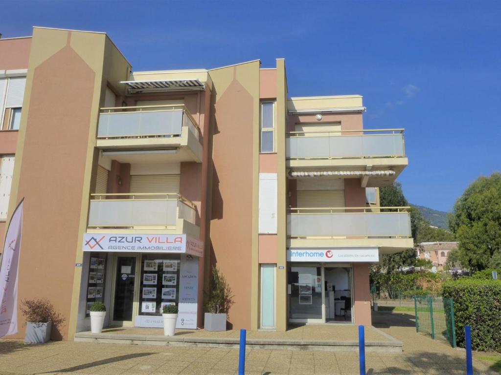 a building with a store in front of it at Apartment La Croix du Sud-4 by Interhome in Cavalaire-sur-Mer