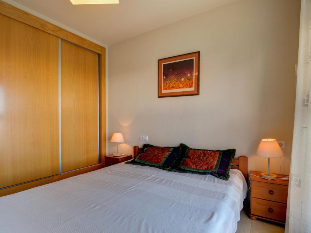 Postel nebo postele na pokoji v ubytování Apartment Punta Cormoran by Interhome