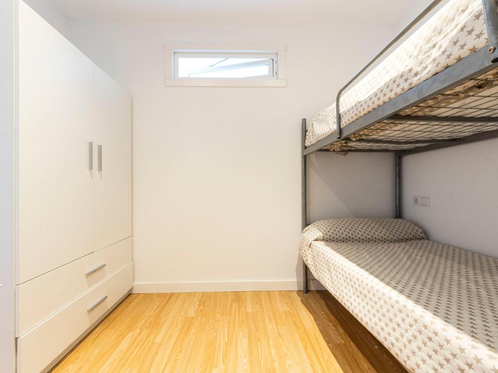 Postel nebo postele na pokoji v ubytování Apartment Rits-1 by Interhome