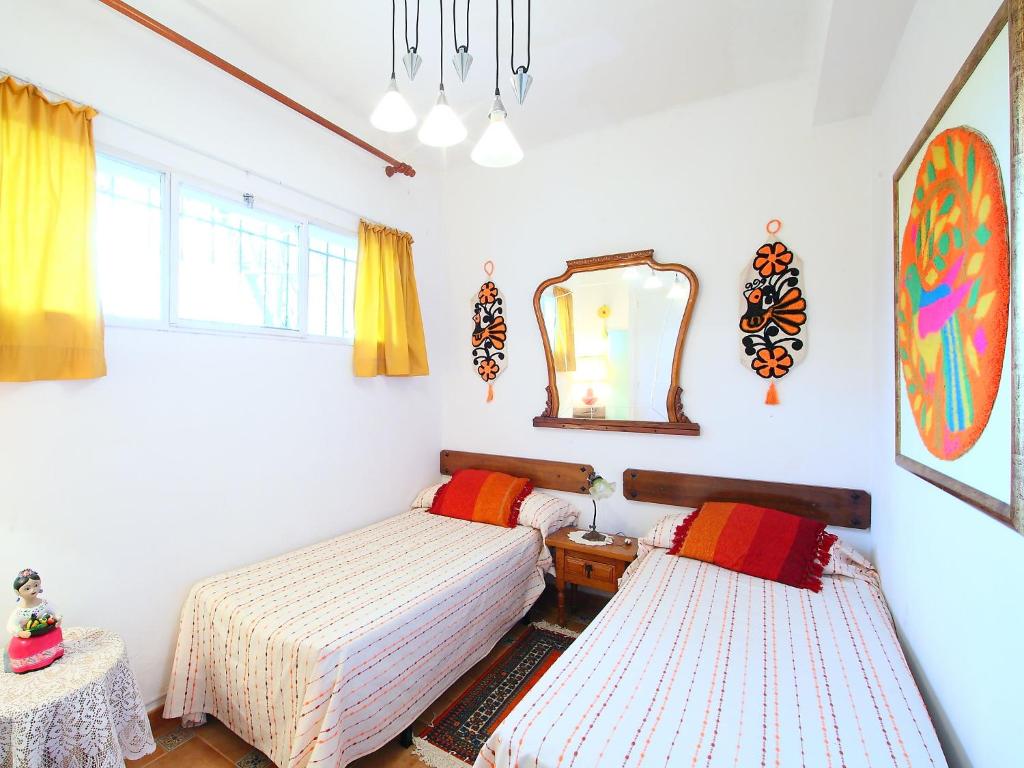 Postel nebo postele na pokoji v ubytování Villa Torre Yato by Interhome