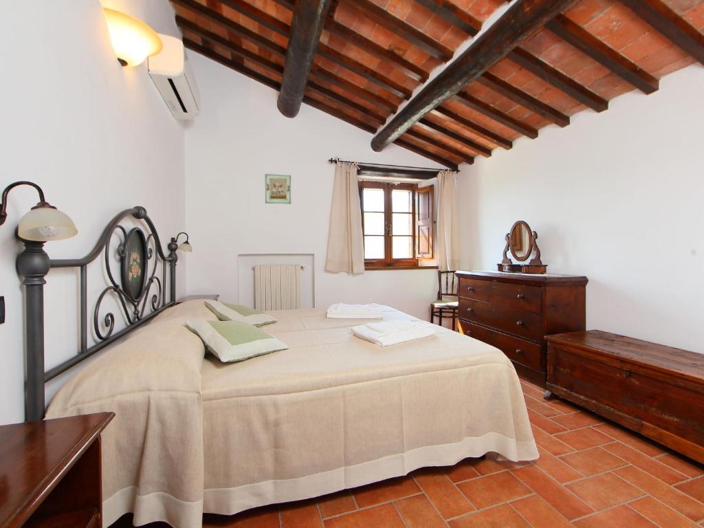 Postel nebo postele na pokoji v ubytování Holiday Home Val d'Orcia by Interhome