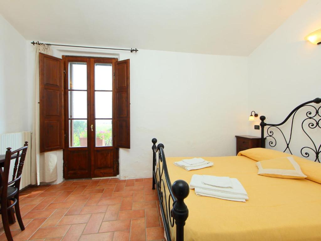 Postel nebo postele na pokoji v ubytování Holiday Home Val d'Orcia by Interhome