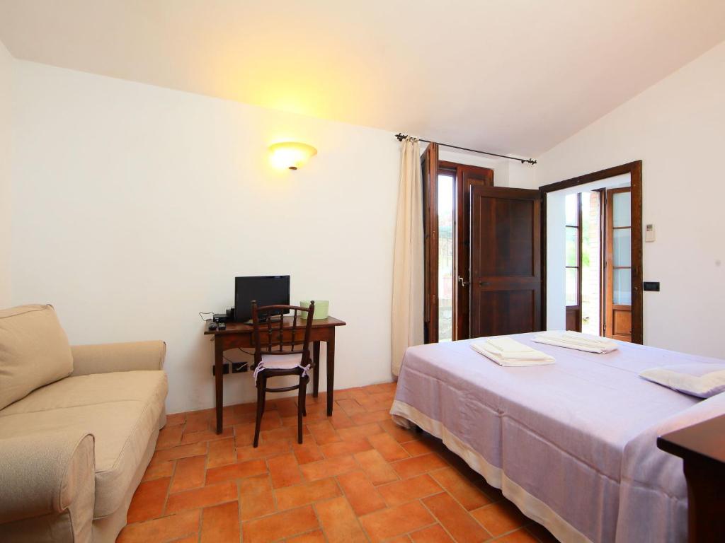 Postel nebo postele na pokoji v ubytování Holiday Home Val d'Orcia by Interhome