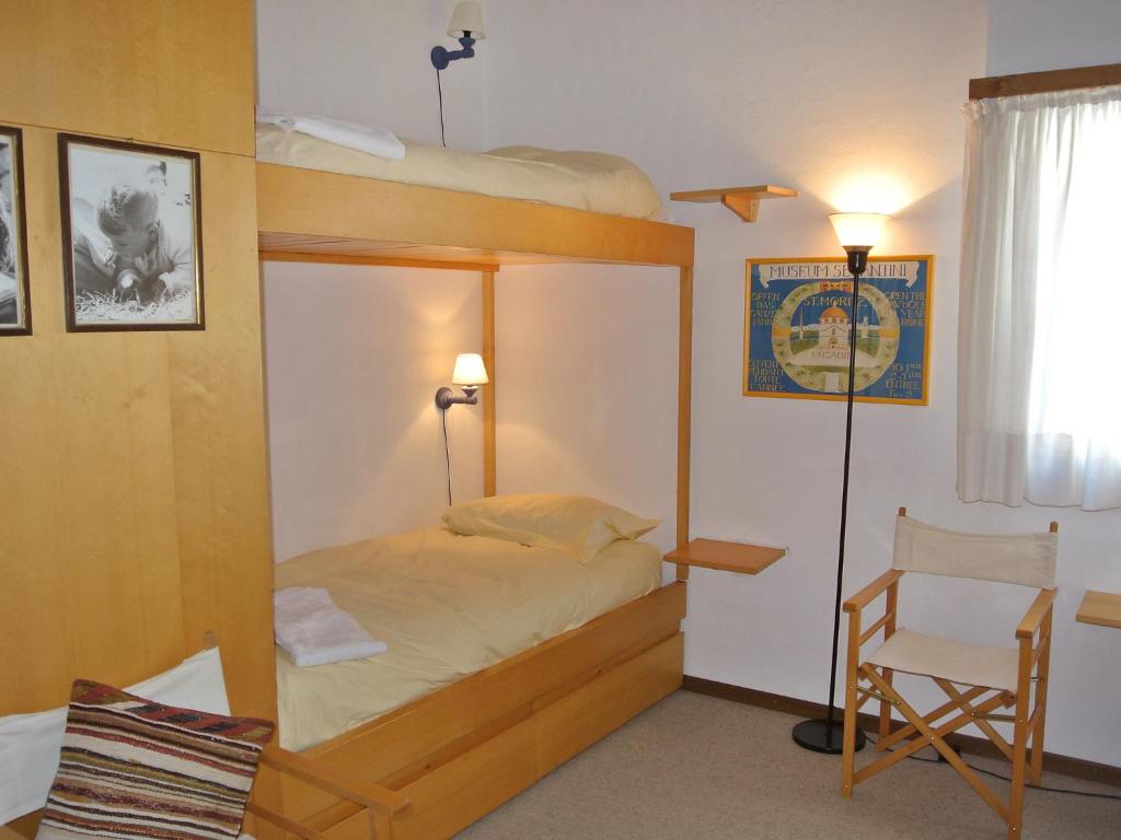 Postel nebo postele na pokoji v ubytování Apartment Chesa Prasüra 10 by Interhome