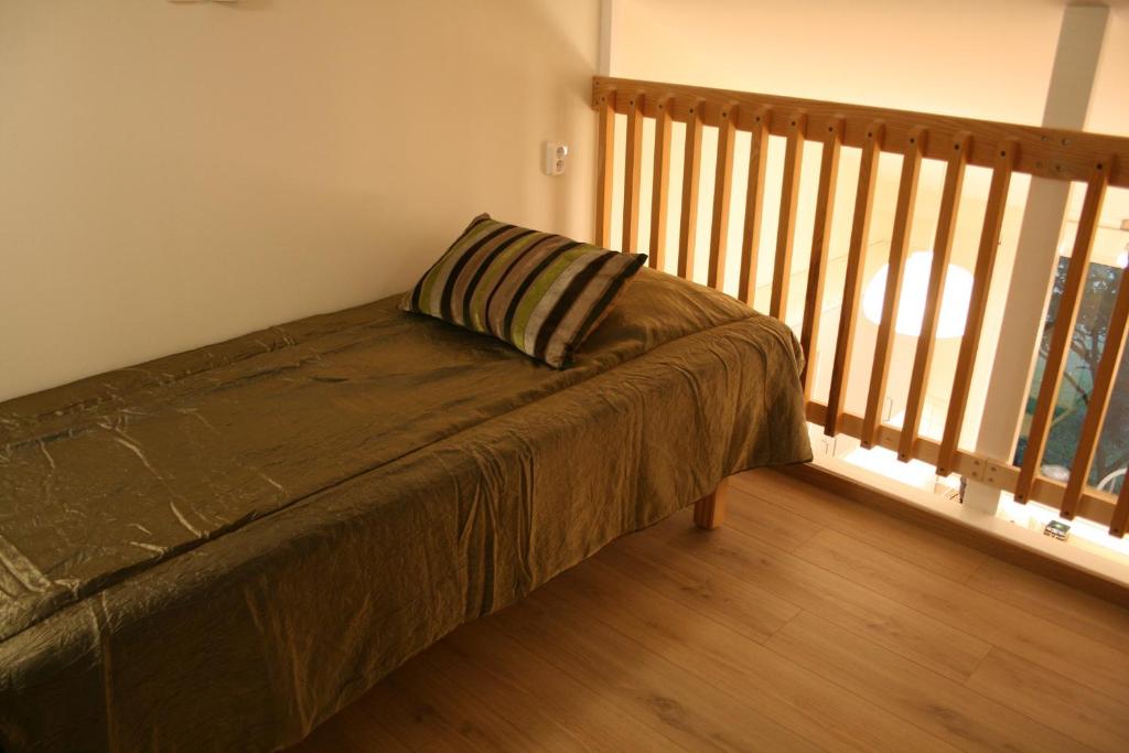 מיטה או מיטות בחדר ב-Lilla Huset på Slätten B&B