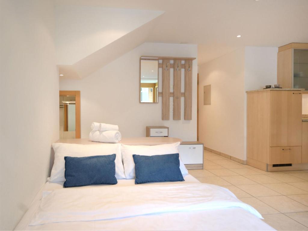 Postel nebo postele na pokoji v ubytování Apartment La Prairie by Interhome