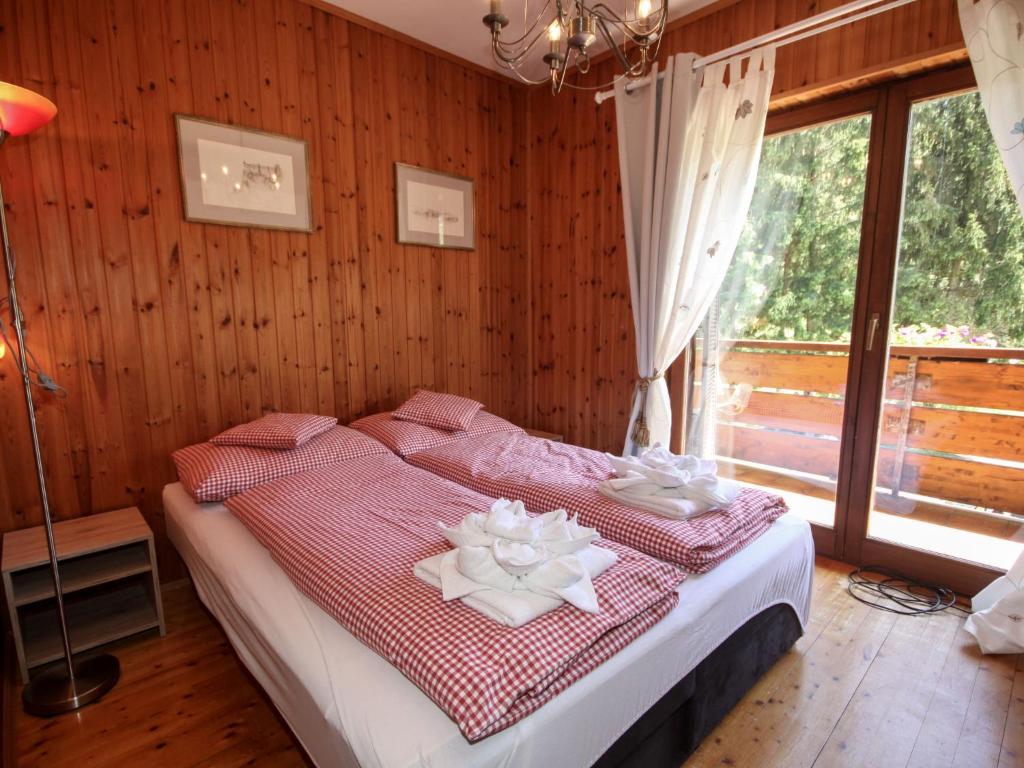 Postel nebo postele na pokoji v ubytování Holiday Home Rustika by Interhome