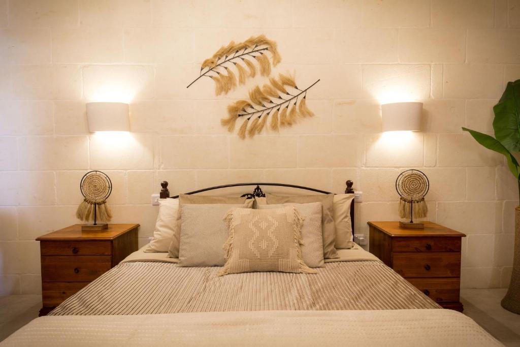 Postel nebo postele na pokoji v ubytování Sweet Life Gozo - Boutique Living