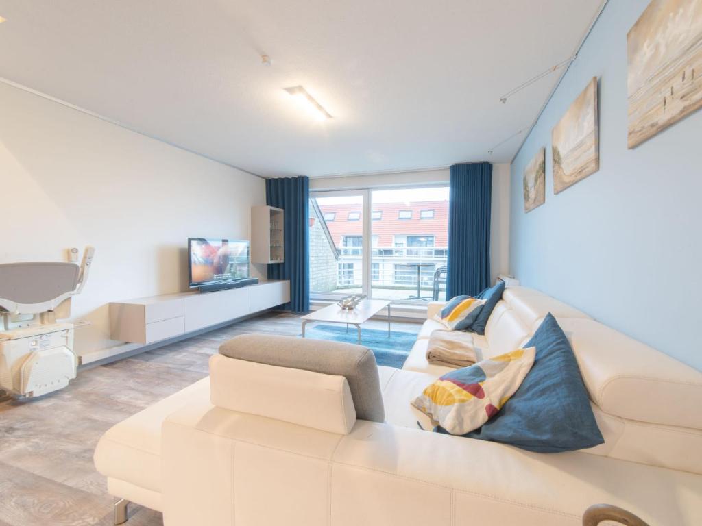 Posezení v ubytování Apartment Tussen water en wind by Interhome