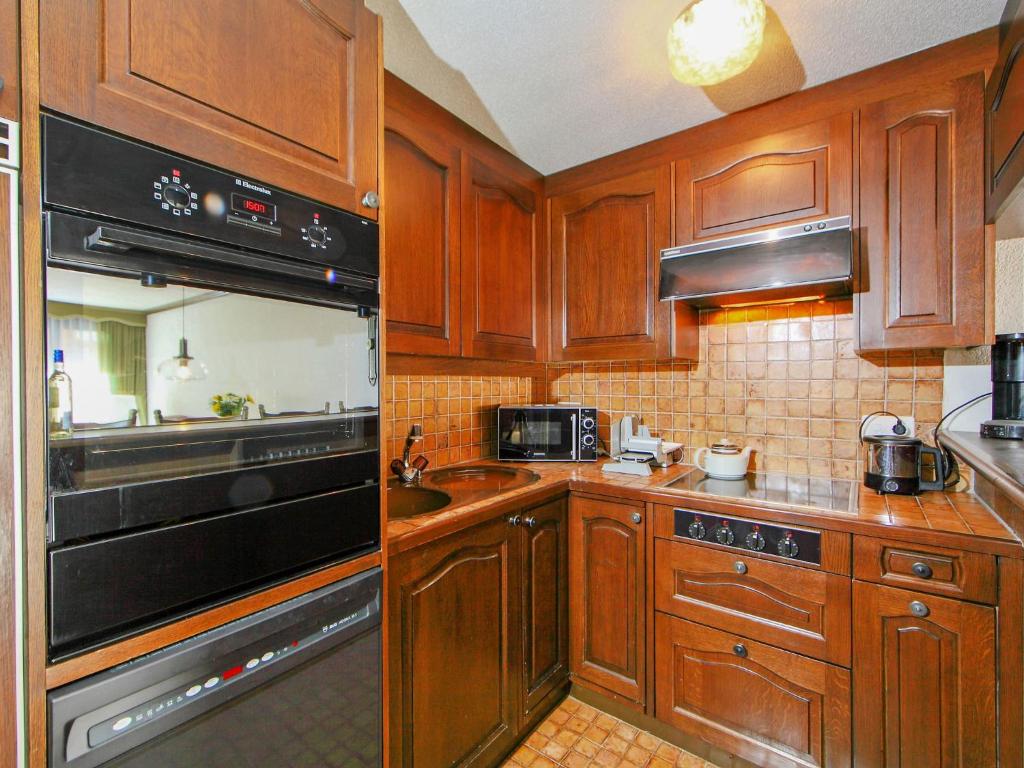 Kuchyň nebo kuchyňský kout v ubytování Apartment Zen Stecken A by Interhome