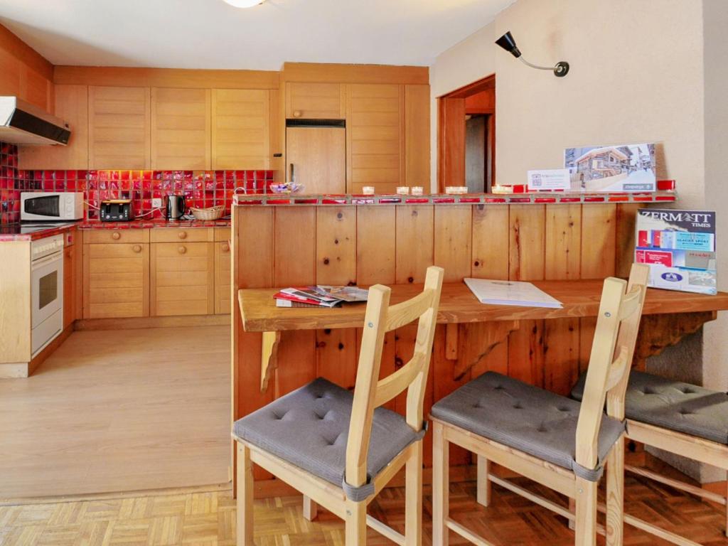 Kuchyň nebo kuchyňský kout v ubytování Apartment Lani by Interhome