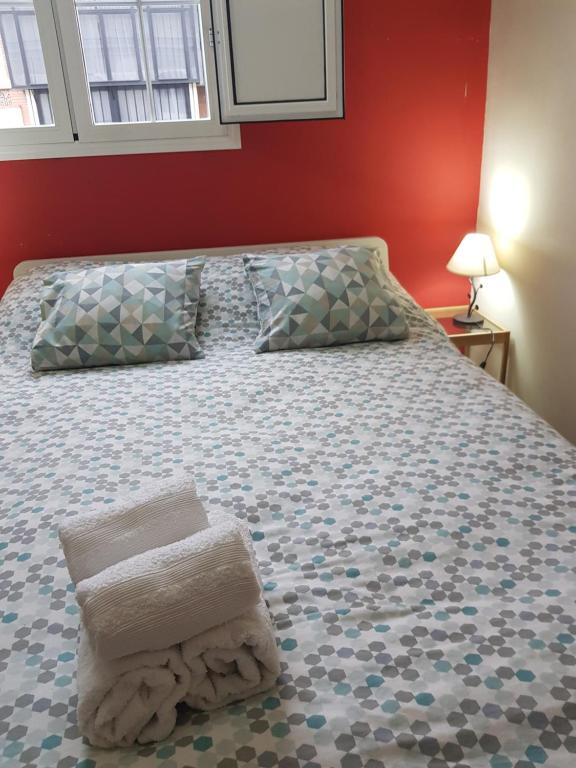 Posteľ alebo postele v izbe v ubytovaní Magnifico Apartamento tipo Dúplex en Triana