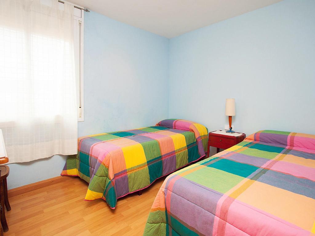 Postel nebo postele na pokoji v ubytování Apartment Mariola by Interhome