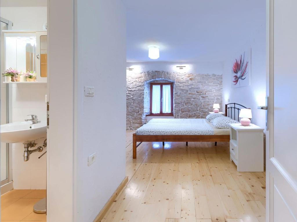 Postel nebo postele na pokoji v ubytování Holiday Home Ivanka by Interhome