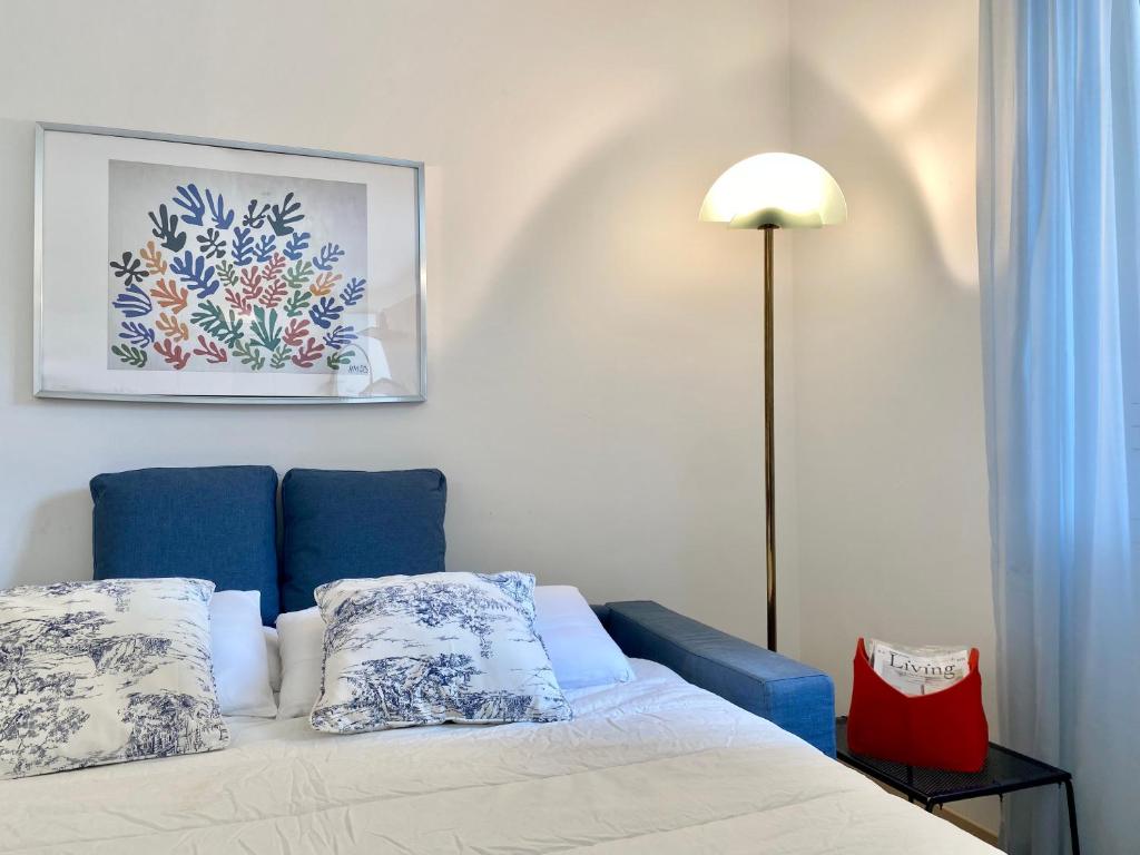 A bed or beds in a room at CasaViva-Lovely Bilo in Santa with AC