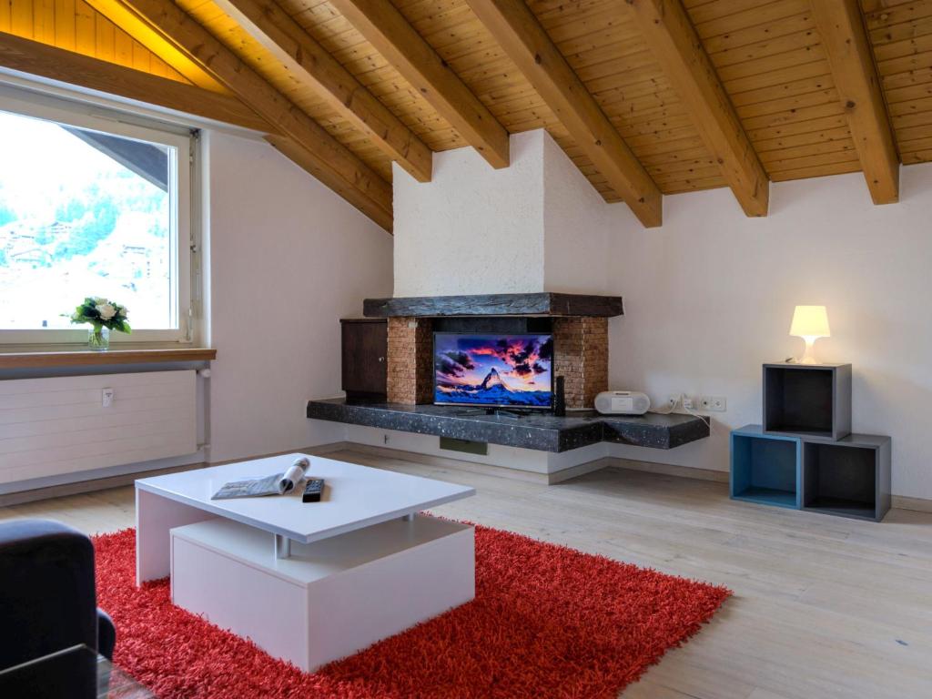 TV a/nebo společenská místnost v ubytování Apartment Granit-5 by Interhome