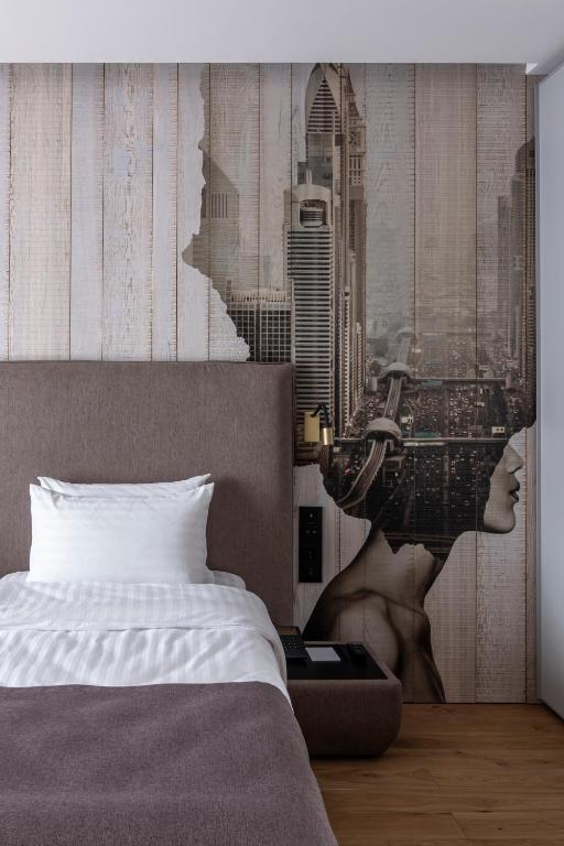 Postel nebo postele na pokoji v ubytování Loft7