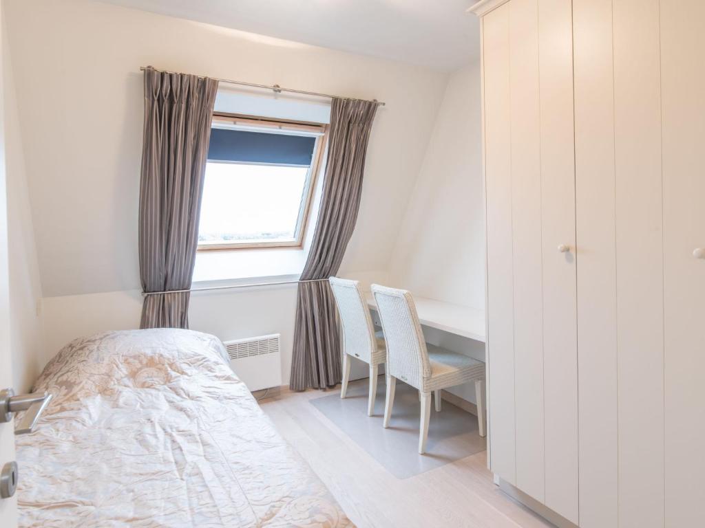 Postel nebo postele na pokoji v ubytování Apartment Duplex by Interhome