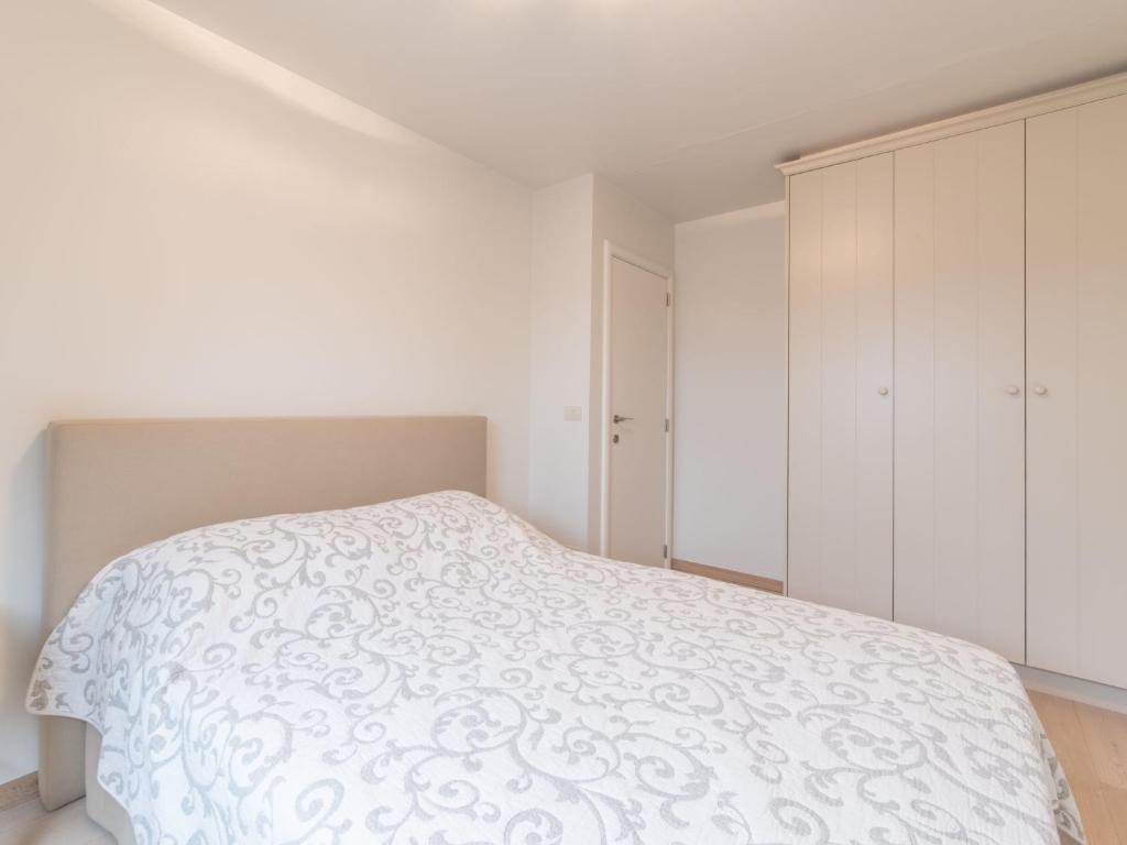 Postel nebo postele na pokoji v ubytování Apartment Duplex by Interhome