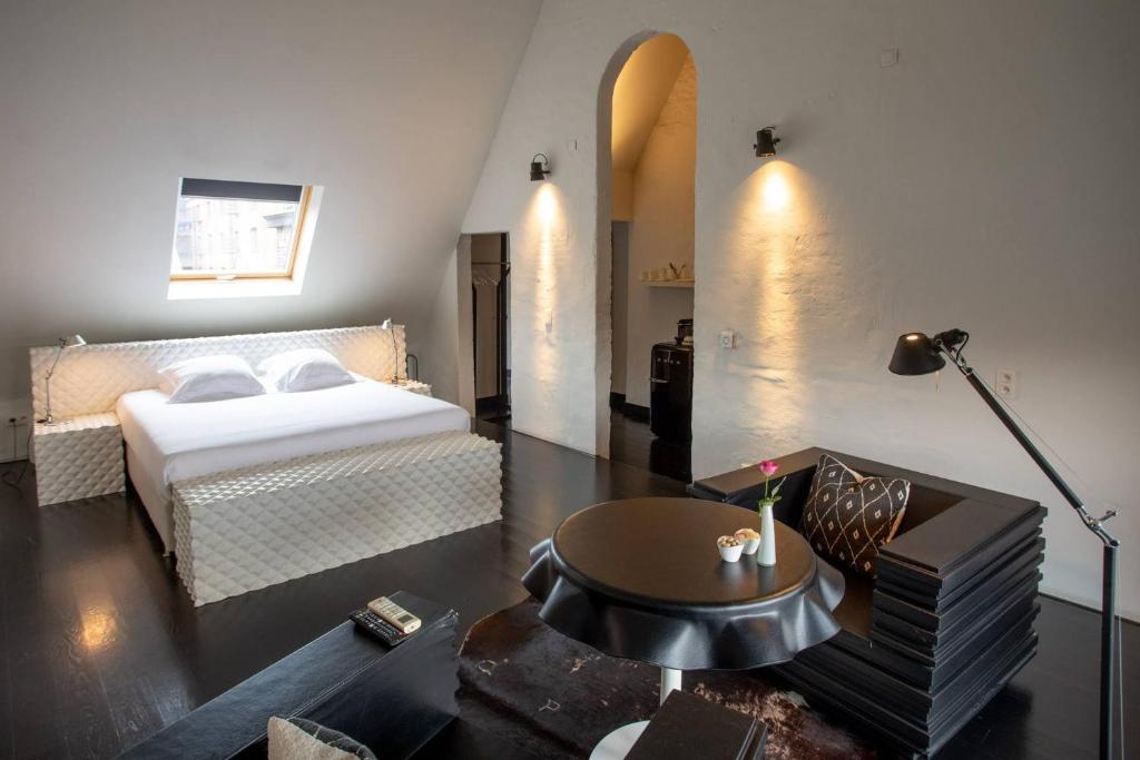 Postel nebo postele na pokoji v ubytování B&B Suites FEEK