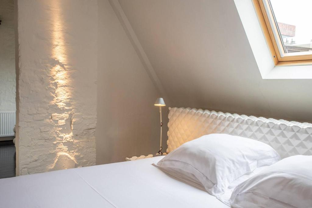 Postel nebo postele na pokoji v ubytování B&B Suites FEEK