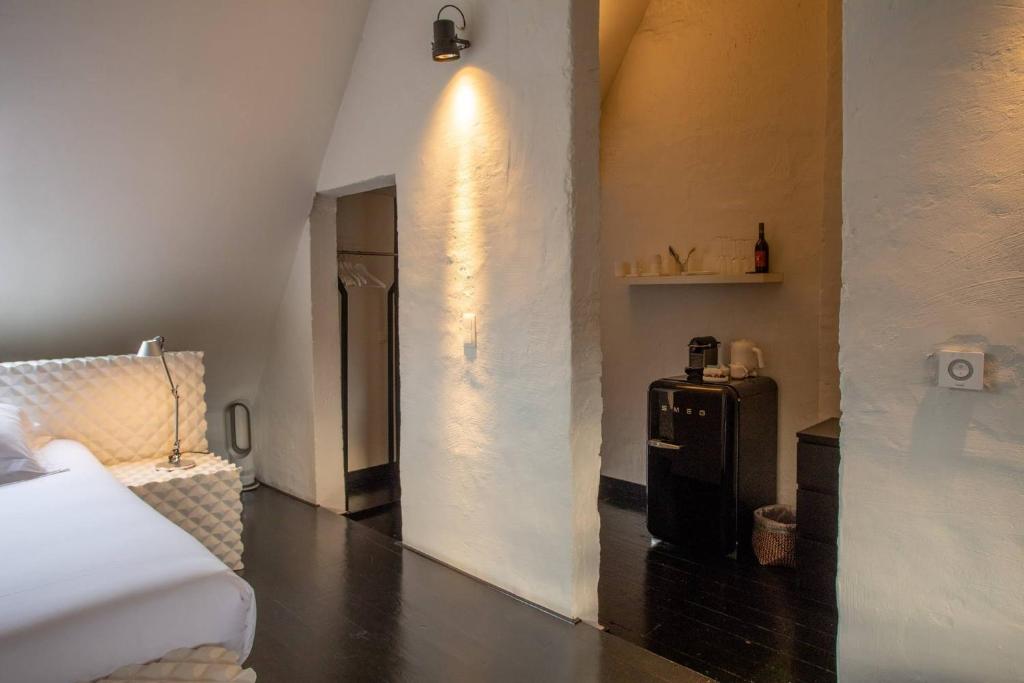 Postel nebo postele na pokoji v ubytování B&B Suites FEEK