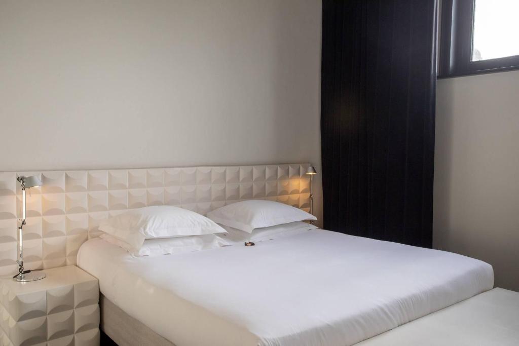 Postel nebo postele na pokoji v ubytování B&B Suites FEEK