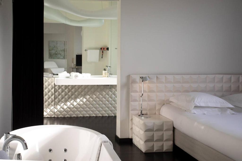 Postel nebo postele na pokoji v ubytování B&B Suites FEEK