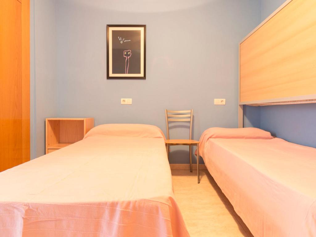 Posteľ alebo postele v izbe v ubytovaní Apartment Monaco by Interhome