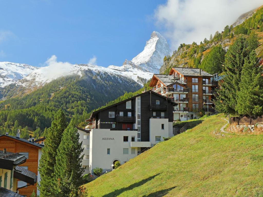a town with a mountain in the background at Apartment Armina by Interhome in Zermatt